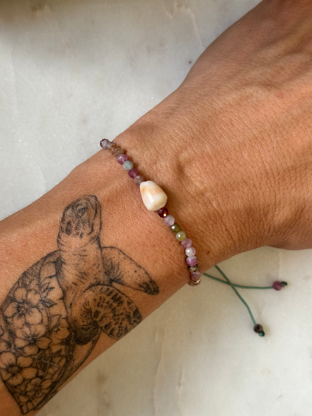 Tourmaline Gemstone Bracelet with centered Cone shell and 14K GF beads - adjustable and waterproof